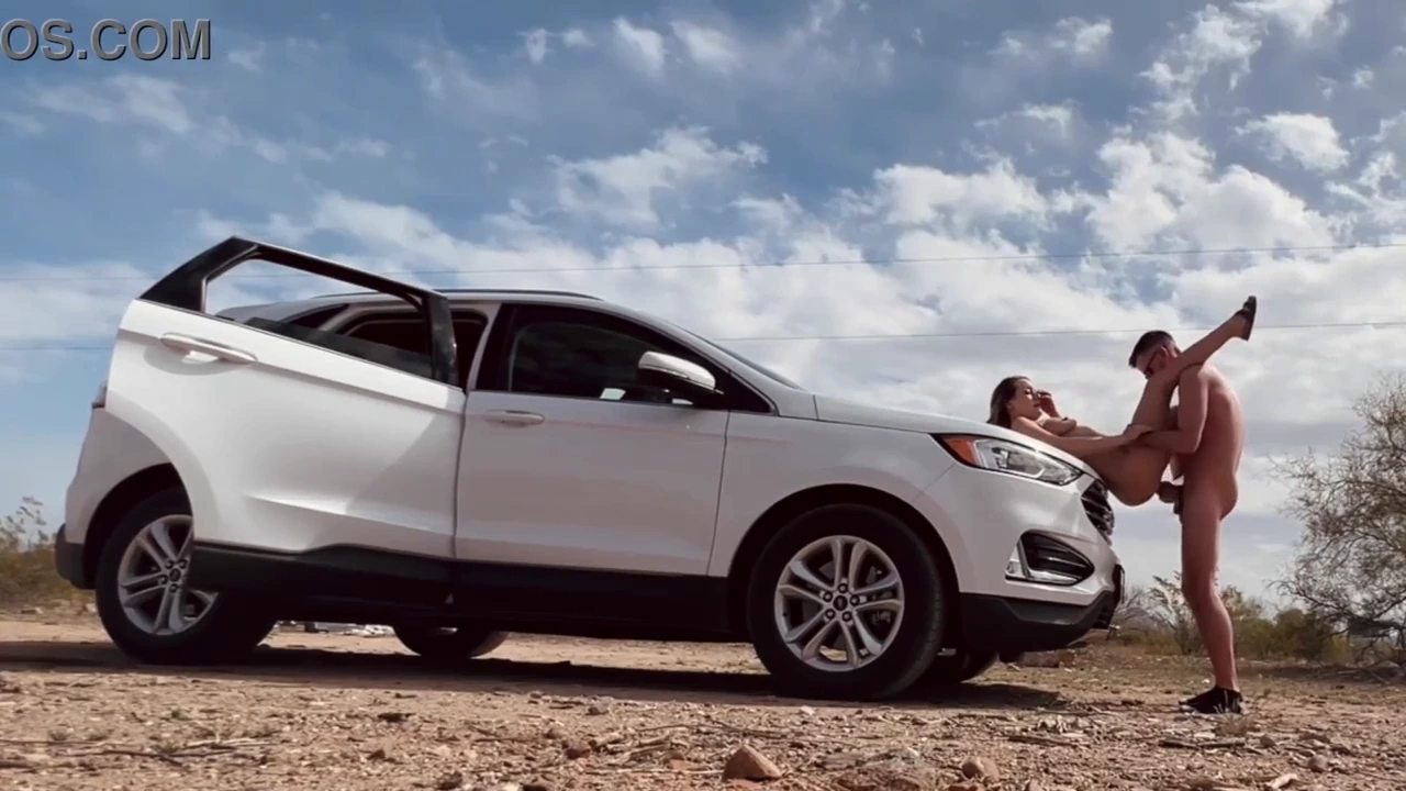 A stunning blonde daringly strips to the side of a road, craving an adrenaline-fueled encounter. A daring display of nudity leads to a sizzling rendezvous, where she indulges in wild, roadside passion.